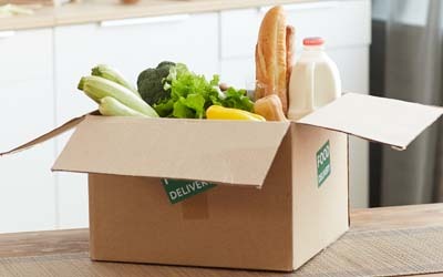Box with Milk bread and vegetables